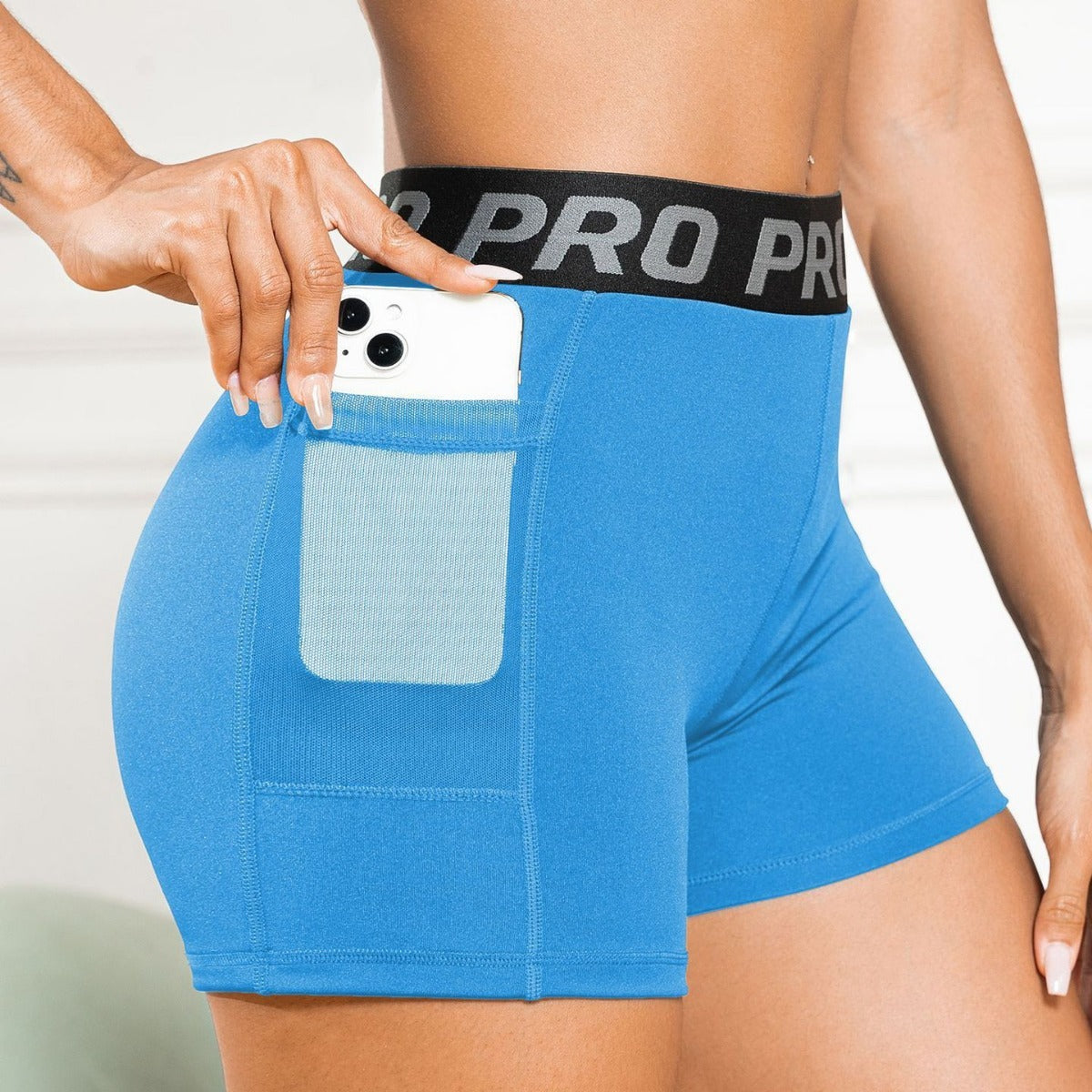 Women's High-Waisted Butt-Lifting Yoga Pants with Mesh Pockets and Three-Quarter Length for Running and Fitness